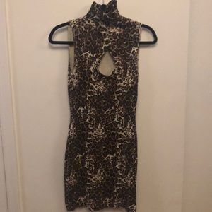 Tight cheetah print sleeveless dress
